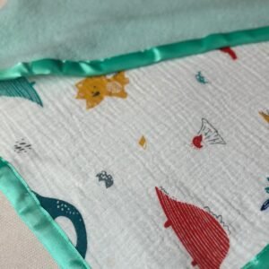 Rebozo de muselina con dinosaurios